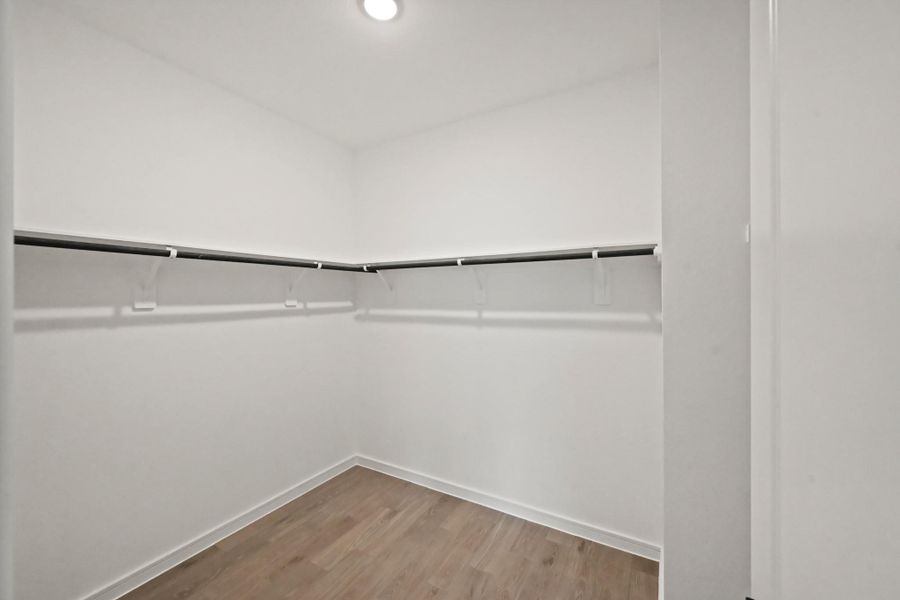 Large walk-in closet in the primary suite Large walk-in closet in the primary suite