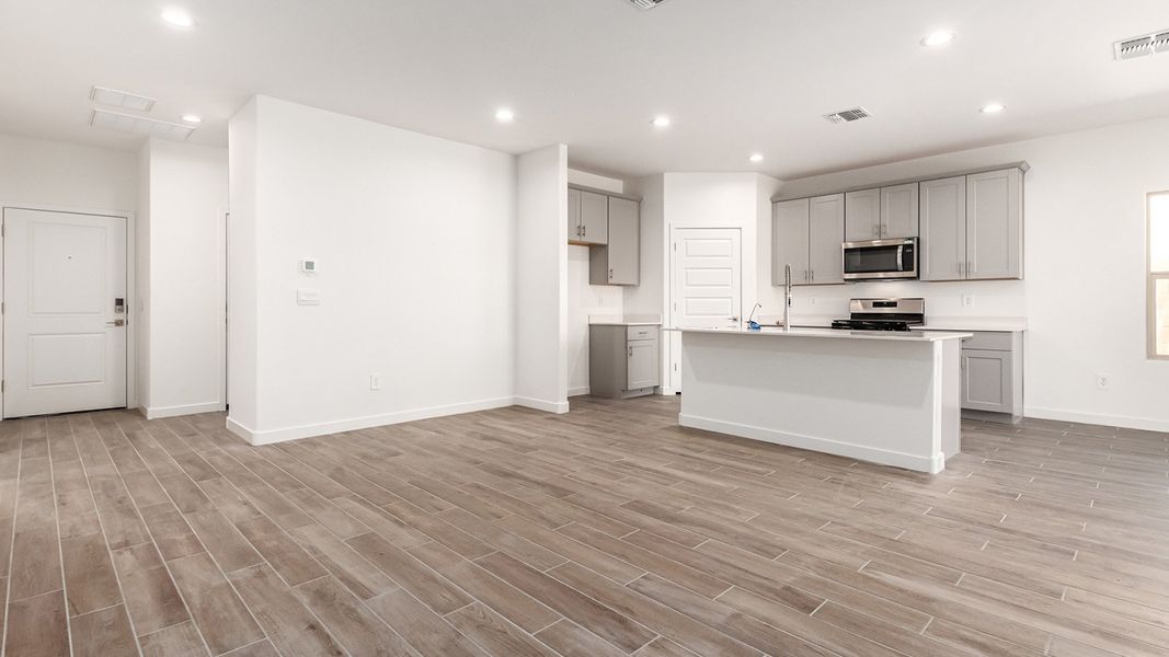 Representative unfurnished interior of a home built from the Baxter by D.R. Horton in The Oasis at Rocking K, Vail (Image 13).