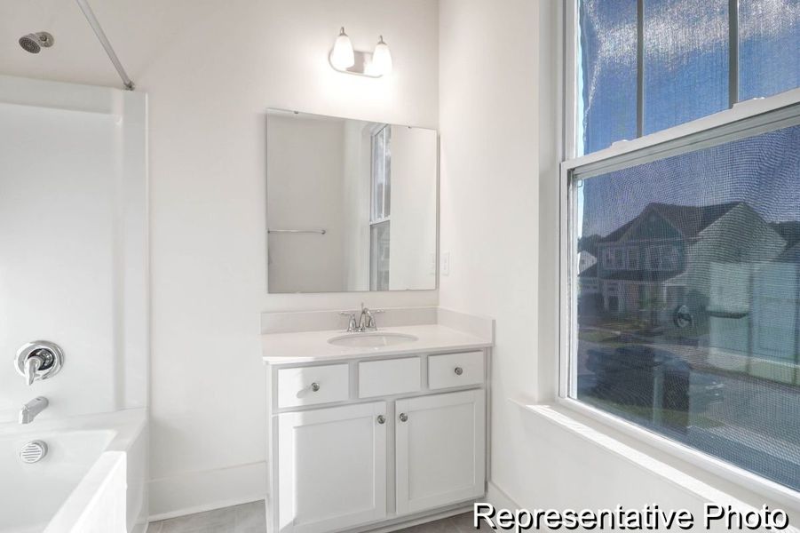 Furnished interior view inside a new home in Homecoming, Ravenel (Image 24).