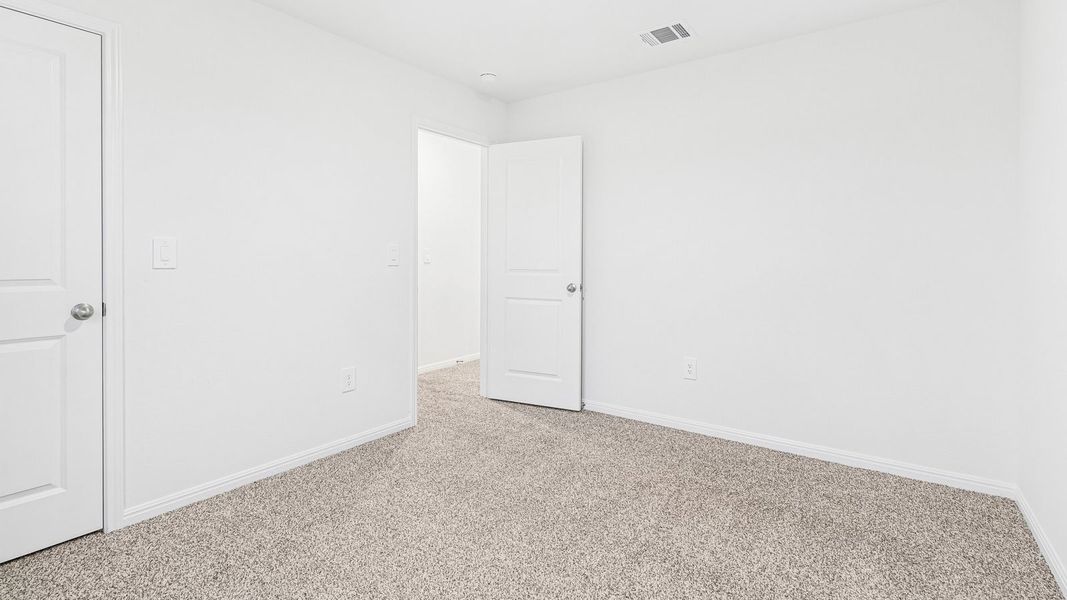 Spacious, unfurnished interior of a new home in Bar W Ranch, Leander (Image 36).