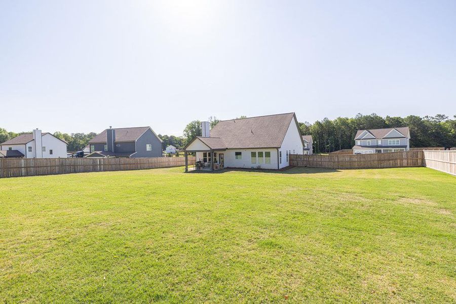 Front exterior of a new home in , Winder, GA, highlighting curb appeal (Image 19).