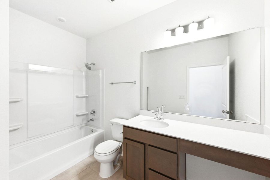 Furnished interior view inside a new home in Stoney Chase, Del Valle (Image 15).