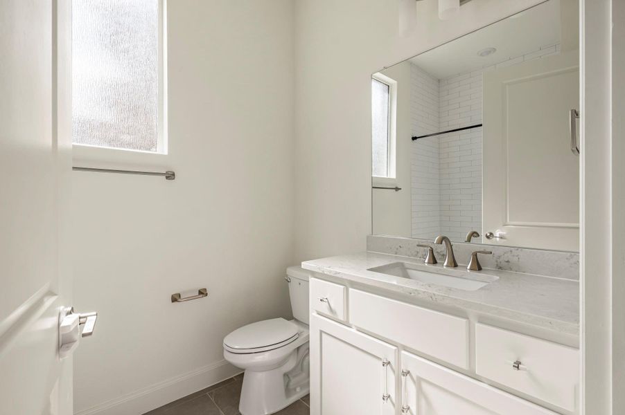 Guest room bathroom, single vanity, shower/bath combo Guest room bathroom, single vanity, shower/bath combo