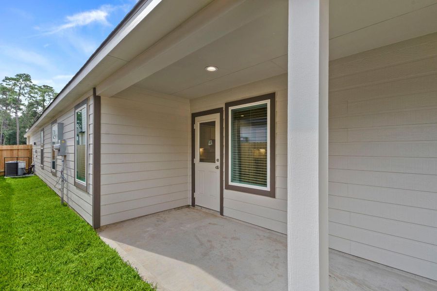 Exterior details and patio area of a home in Cypresswood Landing, Humble (Image 3).