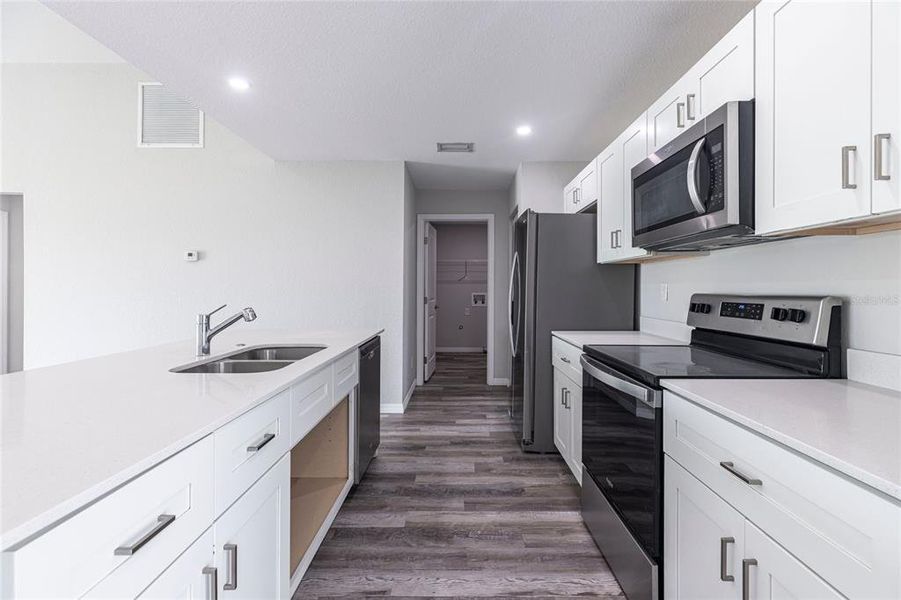 Furnished interior view inside a new home in , Cape Coral (Image 5). Furnished interior view inside a new home in , Cape Coral (Image 5).