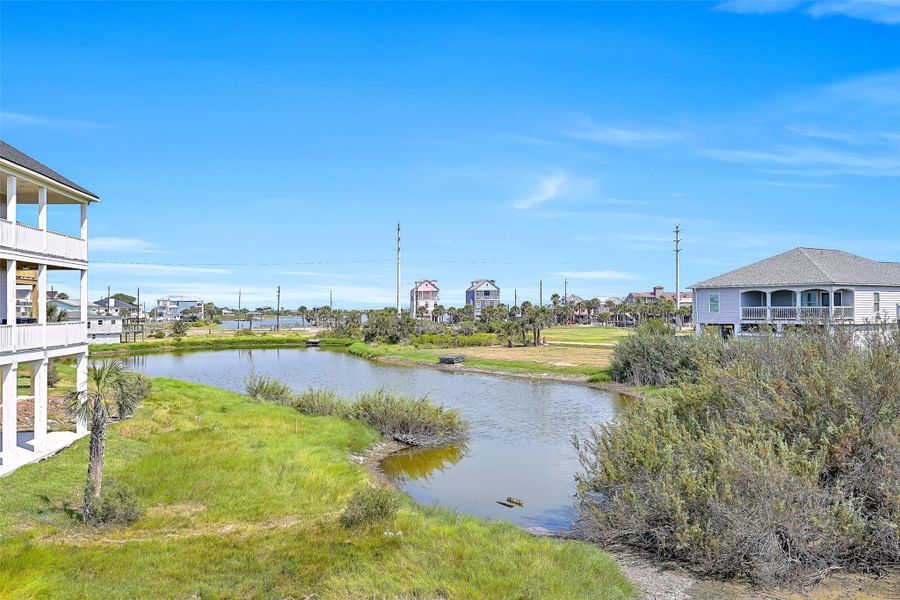 Front exterior of a new home in , Galveston, TX, highlighting curb appeal (Image 22).