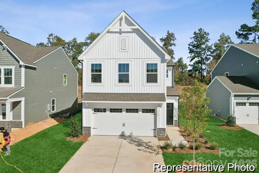 Front exterior of a new home in Shay Crossing, Salisbury, NC, highlighting curb appeal (Image 1). Front exterior of a new home in Shay Crossing, Salisbury, NC, highlighting curb appeal (Image 1).
