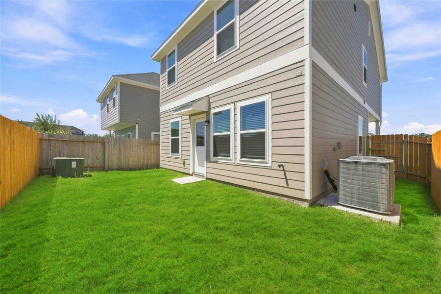 Exterior details and patio area of a home in , Houston (Image 3).