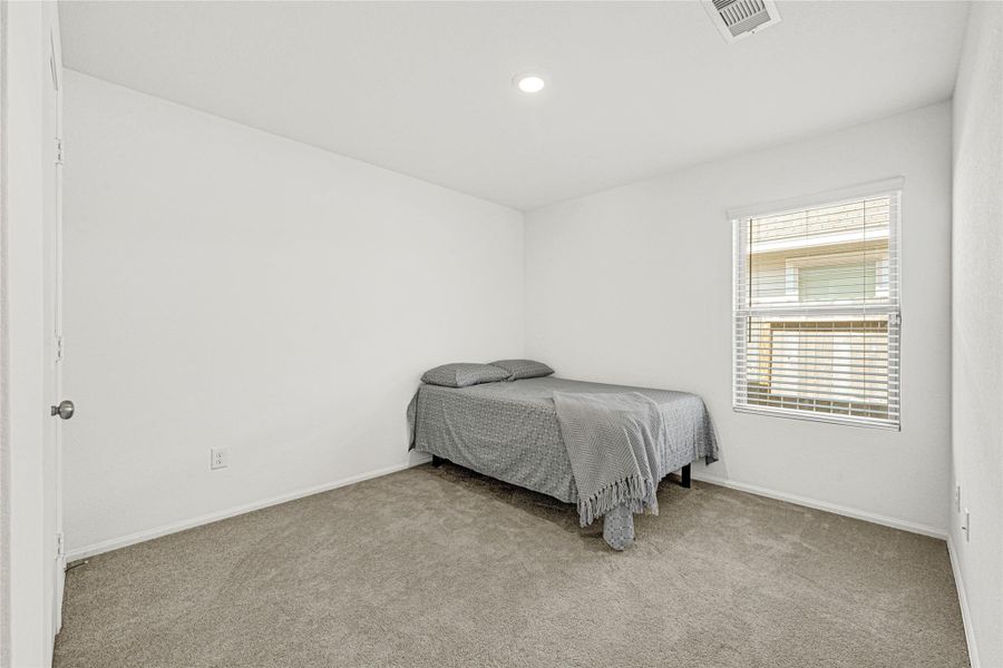 Furnished interior view inside a new home in Townsend Reserve: Cottage Collection, Splendora (Image 12). Furnished interior view inside a new home in Townsend Reserve: Cottage Collection, Splendora (Image 12).