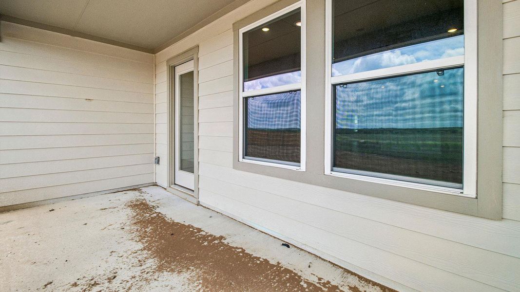 Exterior details and patio area of a home in Prairie Lakes, Buda (Image 2). Exterior details and patio area of a home in Prairie Lakes, Buda (Image 2).