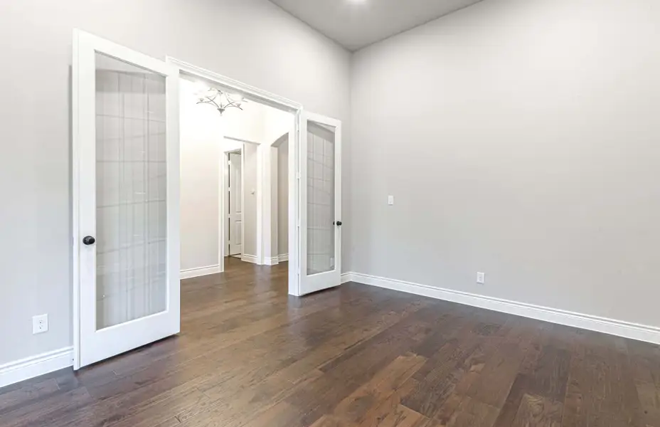 Representative unfurnished interior of a home built from the 3616 by Ravenna Homes in Artavia 70′, Conroe (Image 23).
