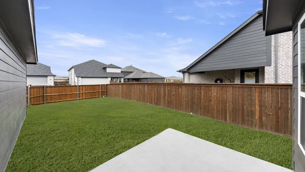Exterior details and patio area of a home in Waterscape, Royse City (Image 3).
