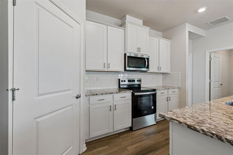 Furnished interior view inside a new home in Star Farms at Lakewood Ranch, Bradenton (Image 49).