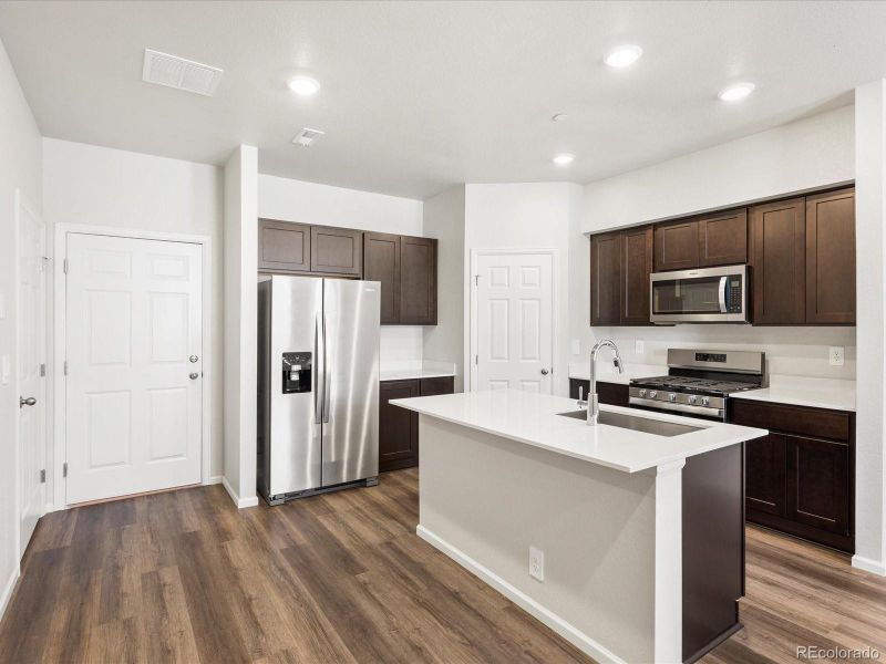 Furnished interior view inside a new home in Poudre Heights: The Meadow Collection, Windsor (Image 11).