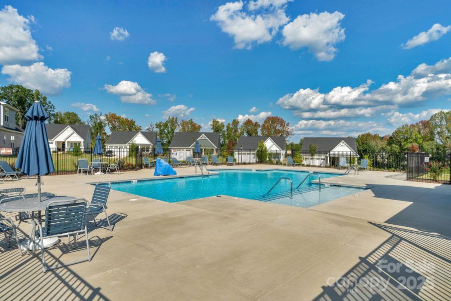 Front exterior of a new home in , Troutman, NC, highlighting curb appeal (Image 24).