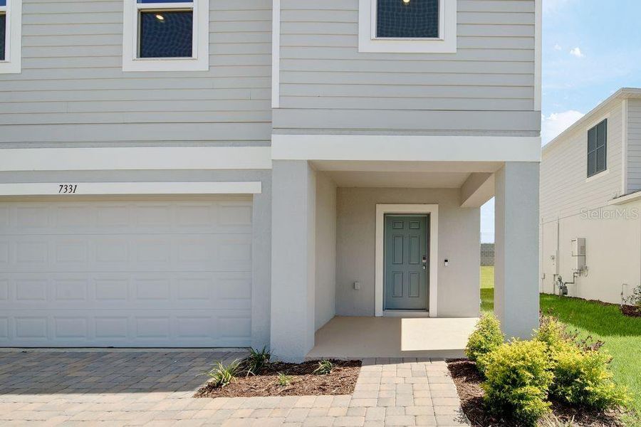 Exterior details and patio area of a home in Waterstone, Groveland (Image 29). Exterior details and patio area of a home in Waterstone, Groveland (Image 29).