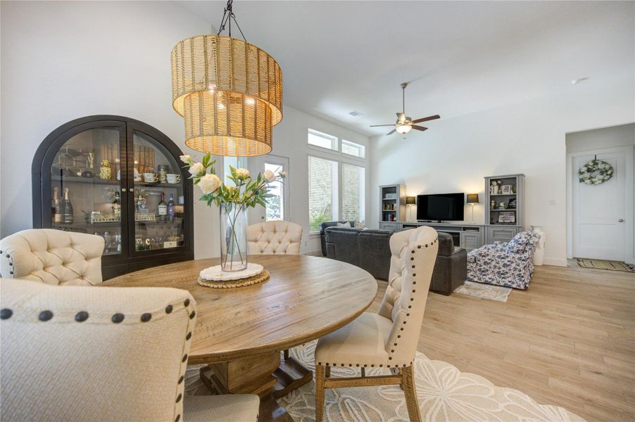 Gather around the dining area, where natural light and open views create a warm setting for meals. Gather around the dining area, where natural light and open views create a warm setting for meals.