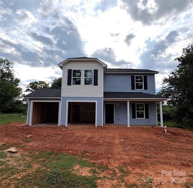Front exterior of a new home in , Statesville, NC, highlighting curb appeal (Image 1). Front exterior of a new home in , Statesville, NC, highlighting curb appeal (Image 1).