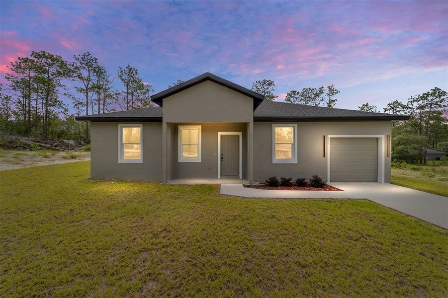 Front exterior of a new home in , Dunnellon, FL, highlighting curb appeal (Image 19). Front exterior of a new home in , Dunnellon, FL, highlighting curb appeal (Image 19).