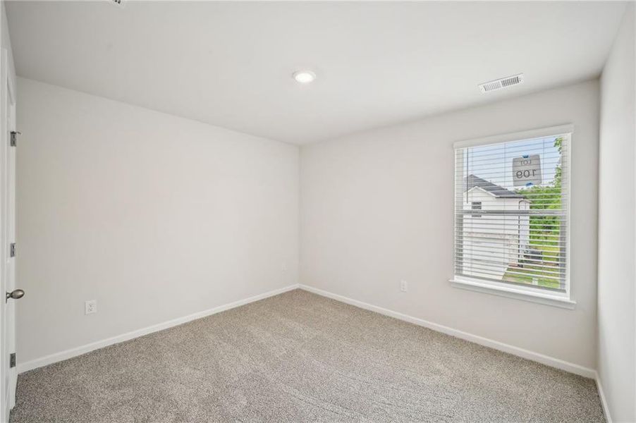 Spacious, unfurnished interior of a new home in Hawthorne Station, College Park (Image 23).