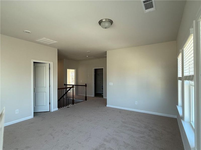 Spacious, unfurnished interior of a new home in River Rock, Ball Ground (Image 24).