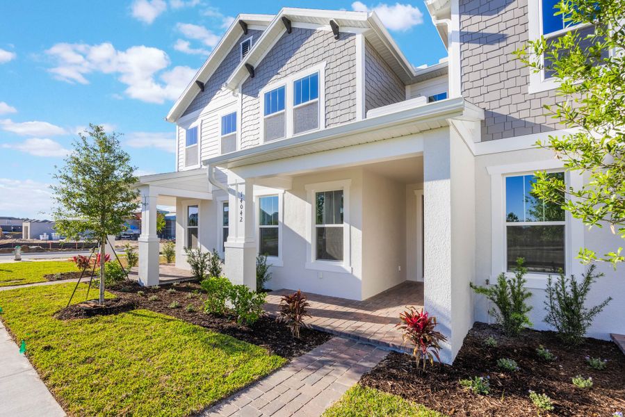 Representative exterior details of a home built from the Edison by Rockwell Homes in Harvest at Ovation - Townhomes, Winter Garden (Image 41). Representative exterior details of a home built from the Edison by Rockwell Homes in Harvest at Ovation - Townhomes, Winter Garden (Image 41).