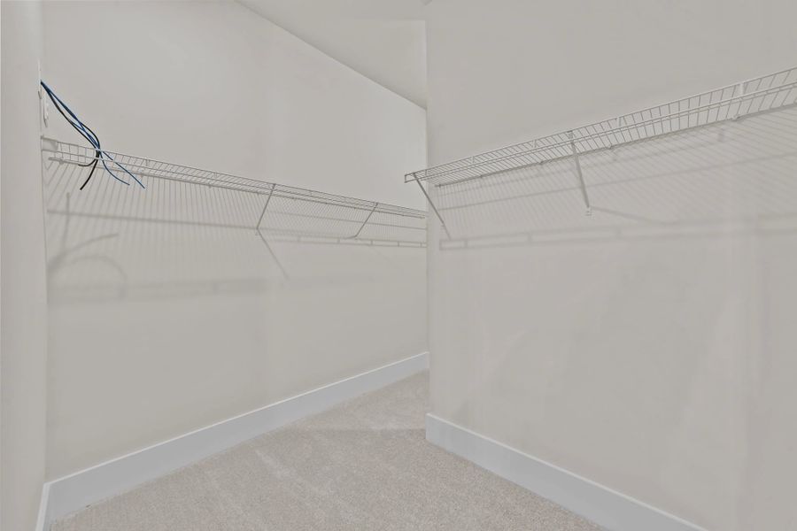 Primary Walk-in Closet Primary Walk-in Closet