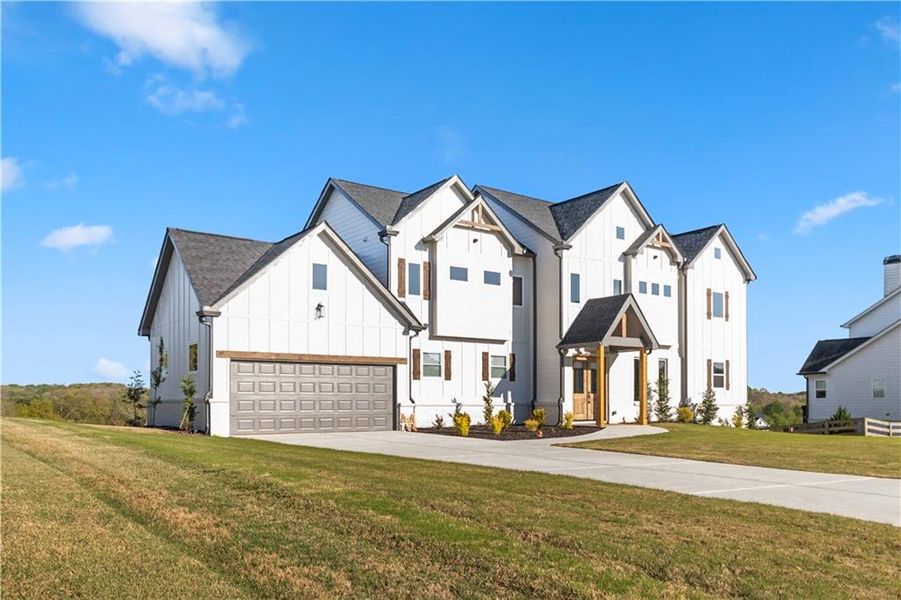 Front exterior of a new home in , Clermont, GA, highlighting curb appeal (Image 2). Front exterior of a new home in , Clermont, GA, highlighting curb appeal (Image 2).