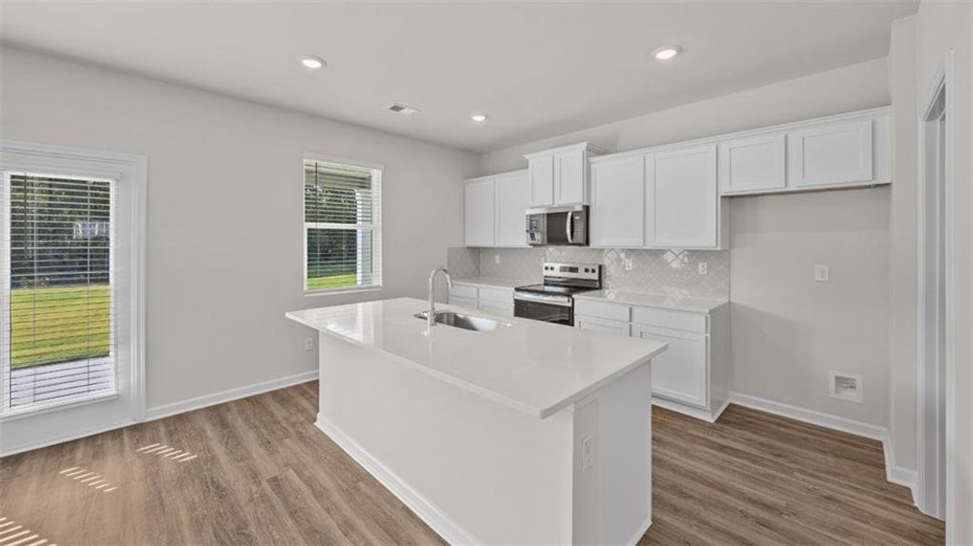 Furnished interior view inside a new home in Poplar Preserve, Newnan (Image 9). Furnished interior view inside a new home in Poplar Preserve, Newnan (Image 9).