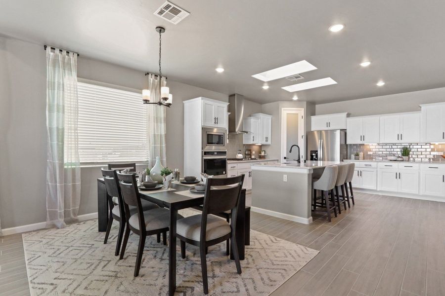 Representative furnished interior of a home built from the Pershing by Hakes Brothers in Paseo Del Este, El Paso (Image 10).