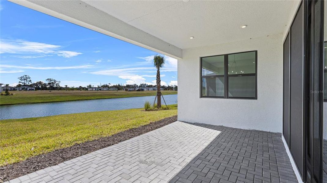 Exterior details and patio area of a home in Woodland Preserve, Parrish (Image 20).