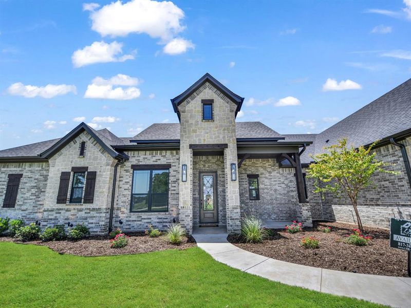 Front exterior of a new home in , Decatur, TX, highlighting curb appeal (Image 2). Front exterior of a new home in , Decatur, TX, highlighting curb appeal (Image 2).