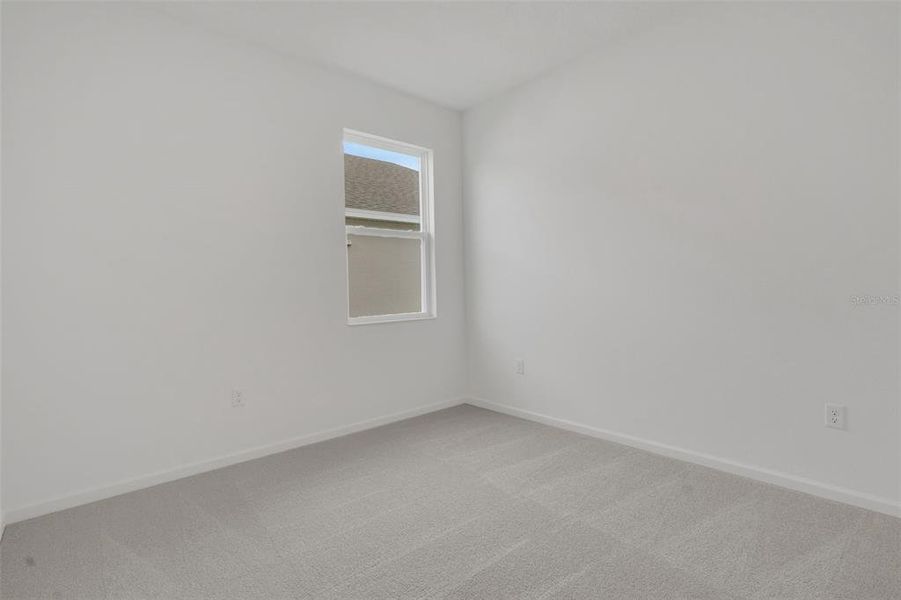 Spacious, unfurnished interior of a new home in Annabelle Estates, Winter Haven (Image 16).