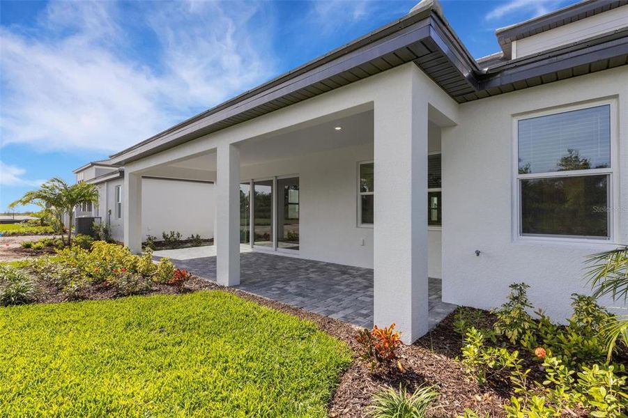 Exterior details and patio area of a home in Hawkstone, Sarasota (Image 4).