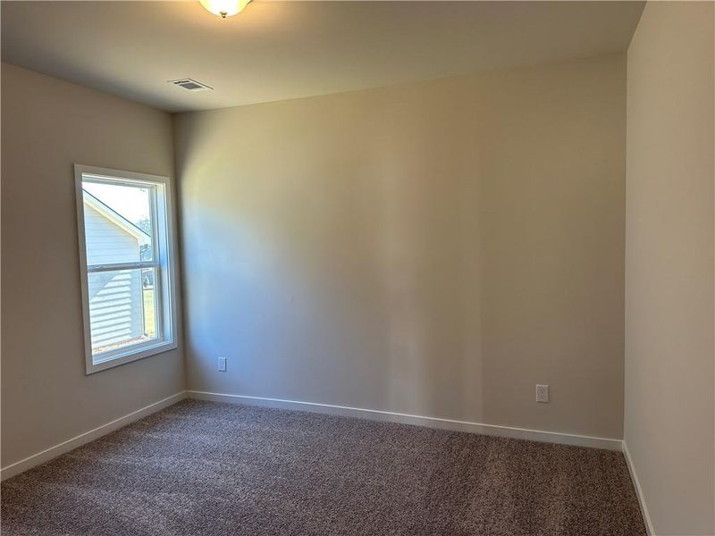 Spacious, unfurnished interior of a new home in Rosewood Lake Preserve, Hoschton (Image 15).
