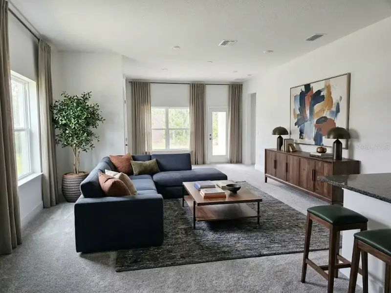 Furnished interior view inside a new home in Harmony Central, St. Cloud (Image 4).