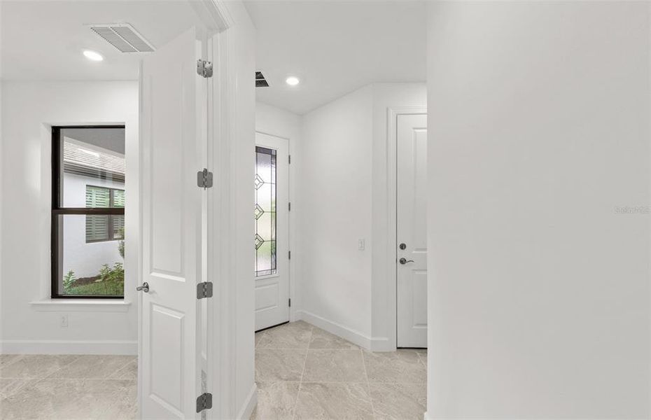 Spacious, unfurnished interior of a new home in Arbor Oaks, North Port (Image 15). Spacious, unfurnished interior of a new home in Arbor Oaks, North Port (Image 15).