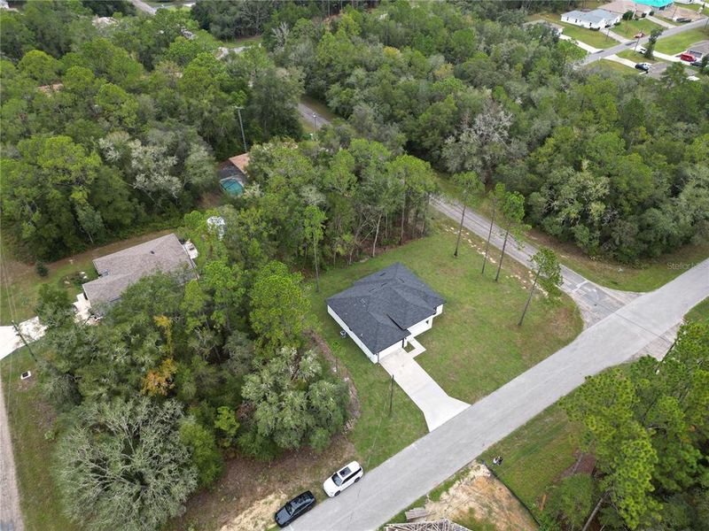 Front exterior of a new home in , Citrus Springs, FL, highlighting curb appeal (Image 25).