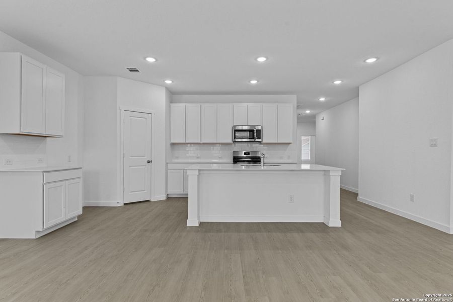 Furnished interior view inside a new home in Guadalupe Heights, Seguin (Image 8).