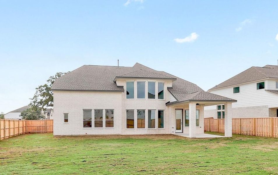 Exterior details and patio area of a home in Parmer Ranch - 60', Georgetown (Image 3).