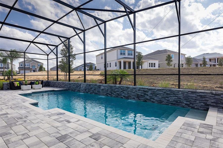 Exterior details and patio area of a home in Emerson Pointe, Apopka (Image 15). Exterior details and patio area of a home in Emerson Pointe, Apopka (Image 15).