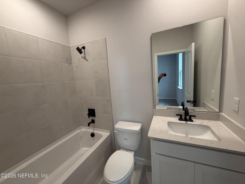 Furnished interior view inside a new home in Reserve East, Flagler Beach (Image 18).