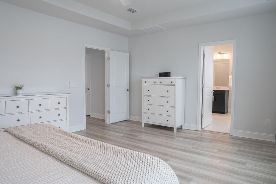 Furnished interior view inside a new home in Park's Edge at Carolina Bay, Charleston (Image 13). Furnished interior view inside a new home in Park's Edge at Carolina Bay, Charleston (Image 13).