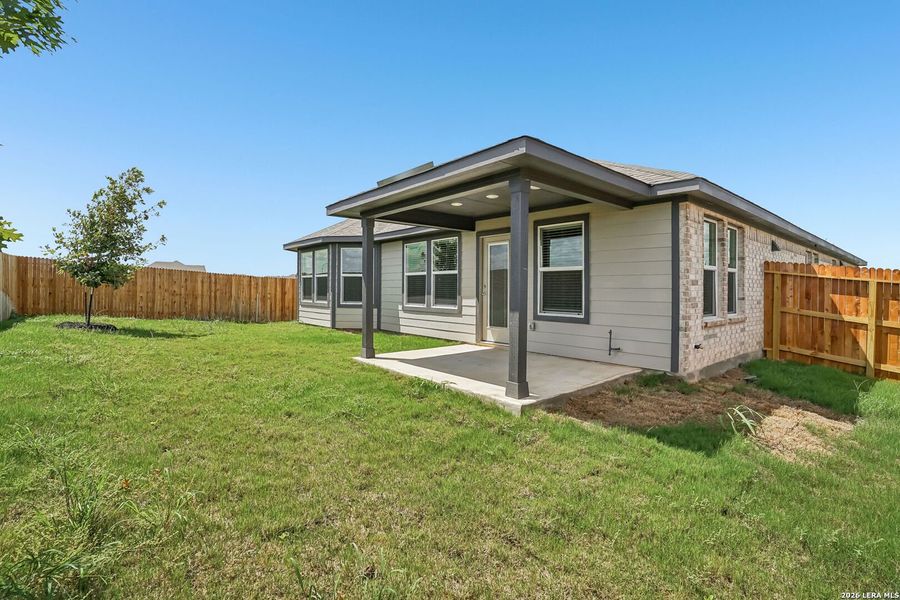 Exterior details and patio area of a home in Carmel Ranch, Schertz (Image 21).