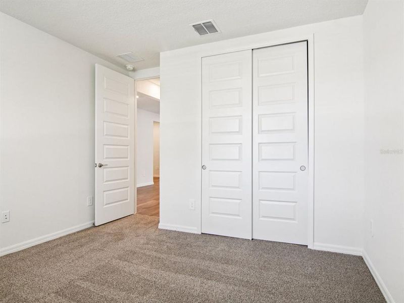 Spacious, unfurnished interior of a new home in Oakfield Trails - Signature Series, Parrish (Image 10).