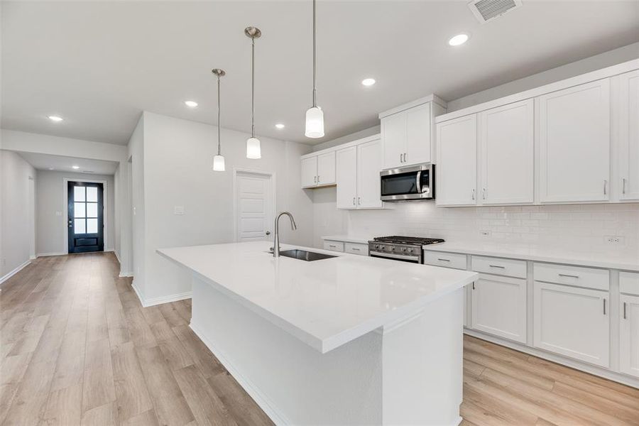 Furnished interior view inside a new home in Spiritas Ranch, Little Elm (Image 9). Furnished interior view inside a new home in Spiritas Ranch, Little Elm (Image 9).