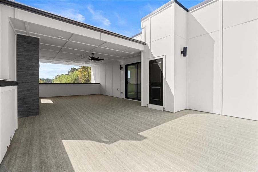 Exterior details and patio area of a home in The Gathering – Alpharetta, Alpharetta (Image 30).