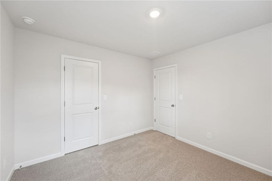 Spacious, unfurnished interior of a new home in Westmont Preserve, Powder Springs (Image 32).