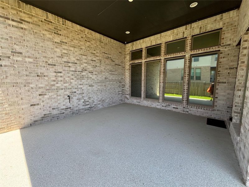 Exterior details and patio area of a home in Lariat 60', Liberty Hill (Image 3).