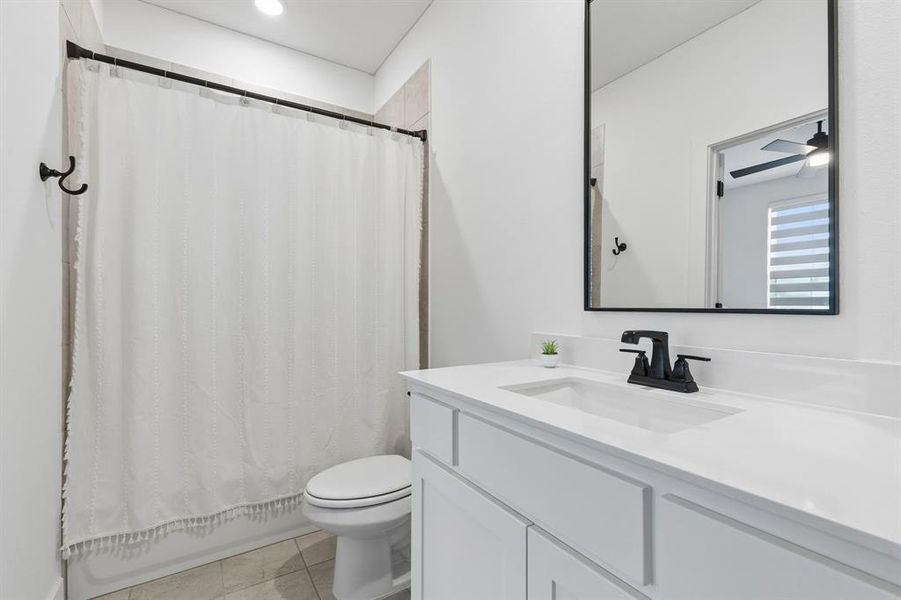 Furnished interior view inside a new home in Windsong Ranch 71' Series, Prosper (Image 29).